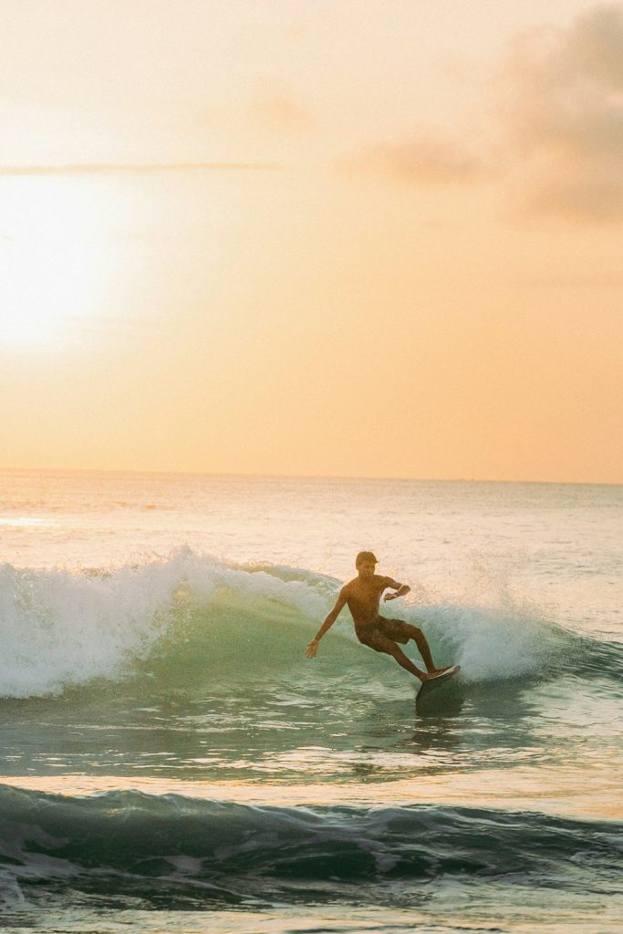 A man surfing the waves in the ocean